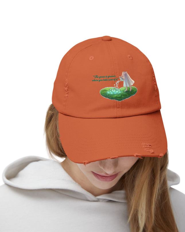 "The Grass is Greener Where You Take Care of It" Unisex Distressed Cap